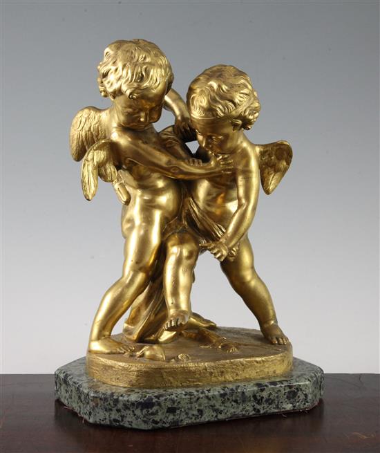 A French ormolu group of two wresting cherubs, 11.5in.